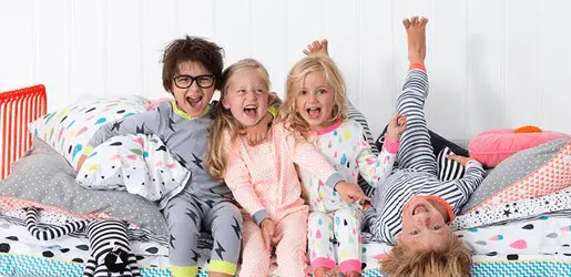 4 kids wearing pajamas