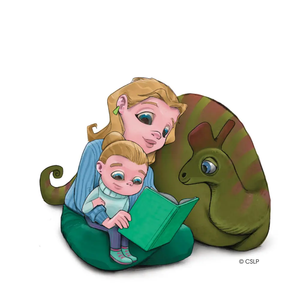 caregiver and child reading abook right beside a dinosaur