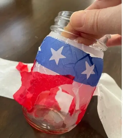 Stars & Stripes Lanterns: mason jar decorated with red, blue and white paper