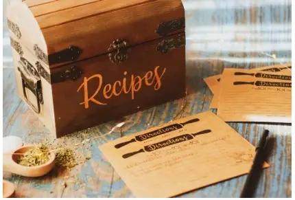 family recioe box and recipe card s on table