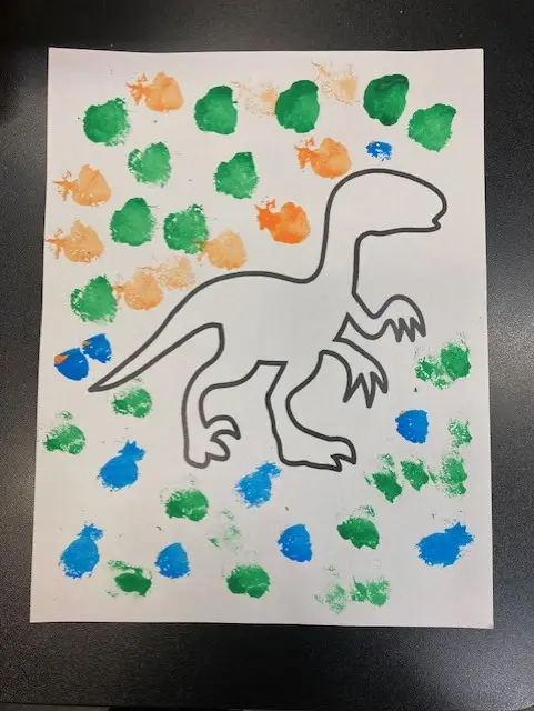 child's painting of a dinosaur