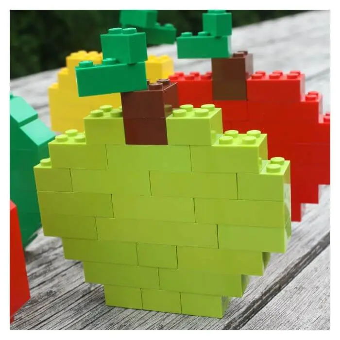 green, yellow, and red LEGO apples made with basic bricks
