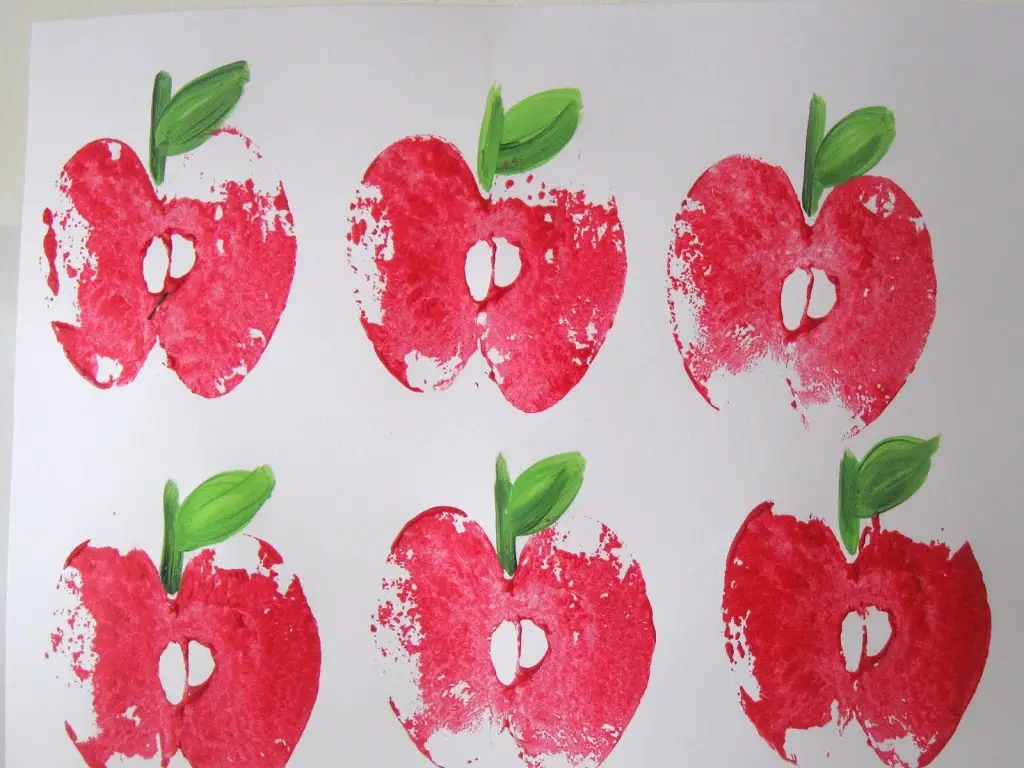 apple prints made using apples and red/green paint