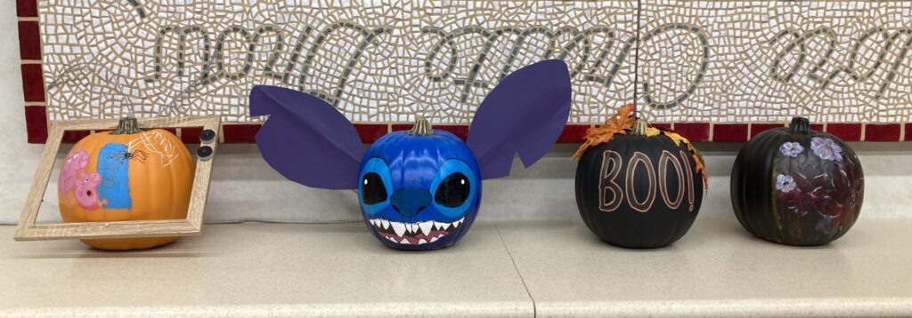 4 decorated pumpkins